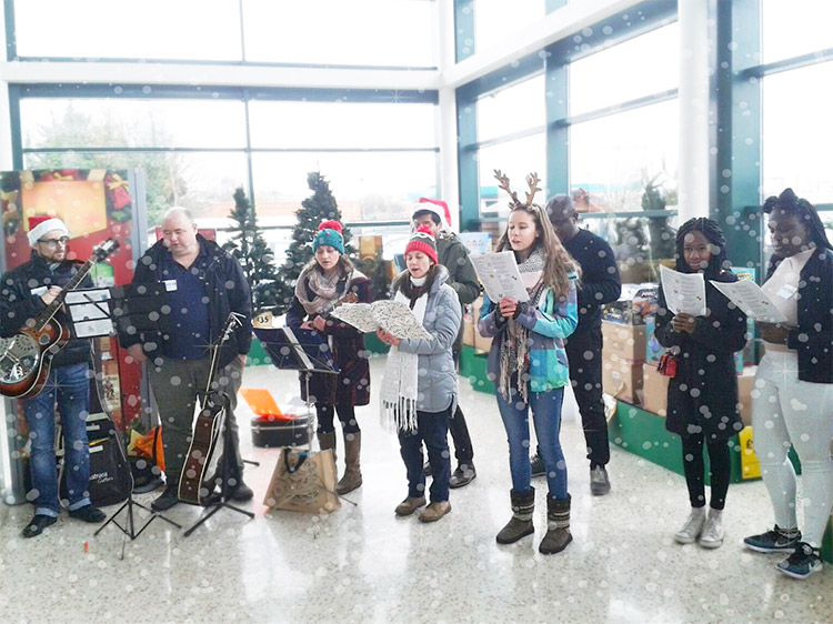 Carolling for EVC Uganda fundraising