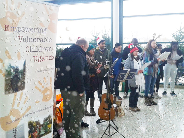 Carolling for EVC Uganda fundraising